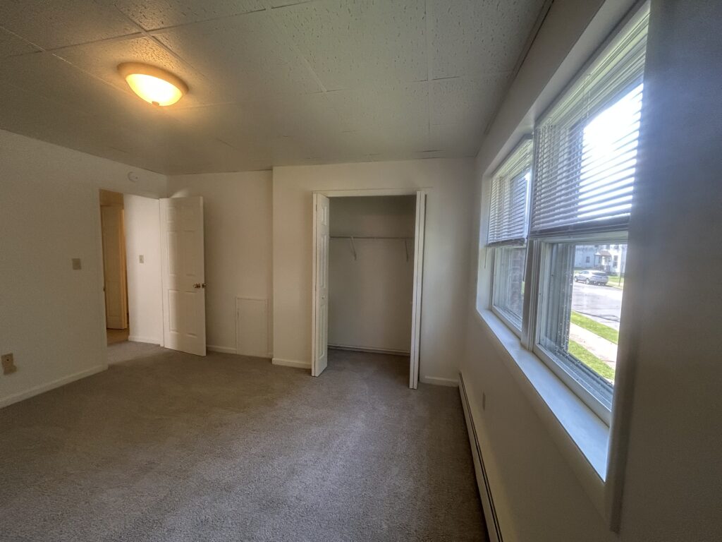 Large primary bedroom and closet at Sheridan St Apartment in Williamsport PA