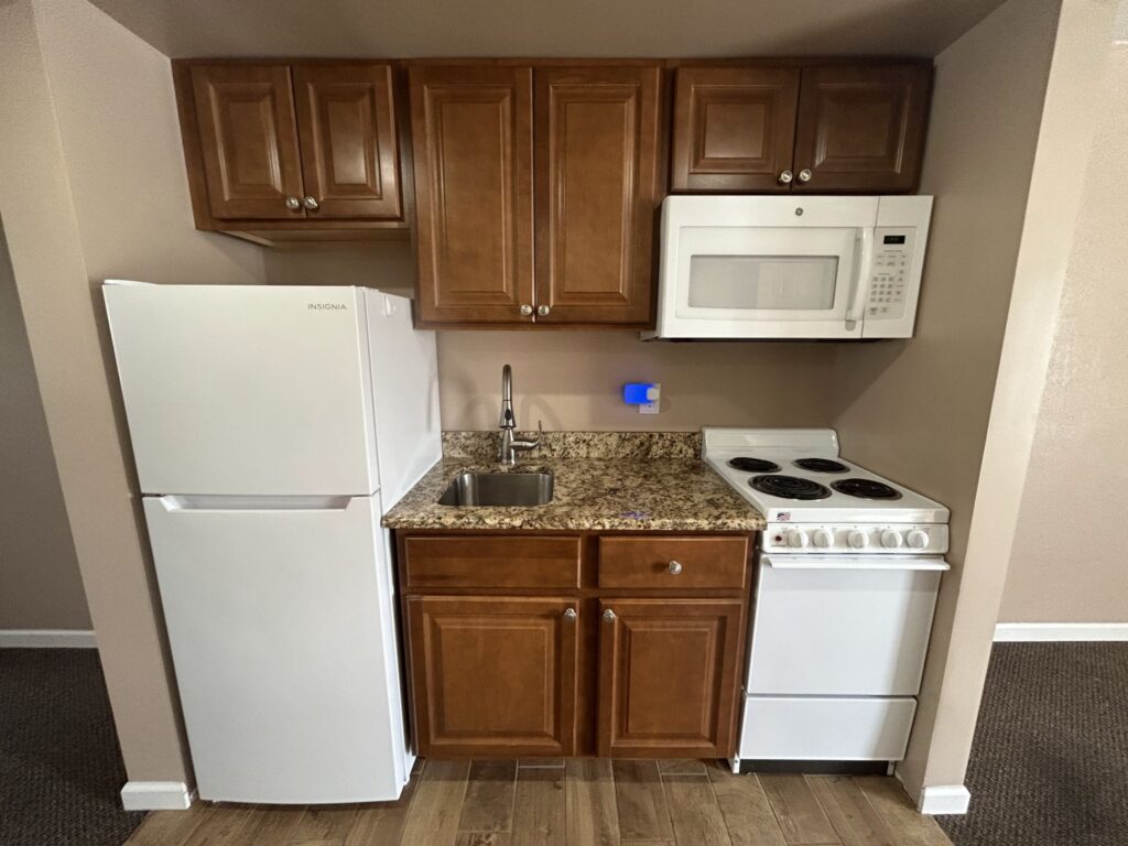 Chatham Street Apartments kitchen area with updated appliances and cabinetry in Williamsport, PA