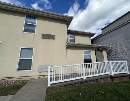 On-sight laundry entrance at the rear of Chatham St Apartments in Williamsport PA